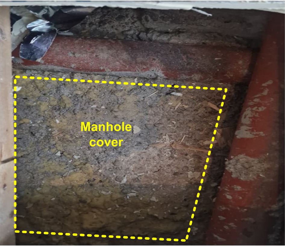 4. The manhole cover appears rusty and is not airtight